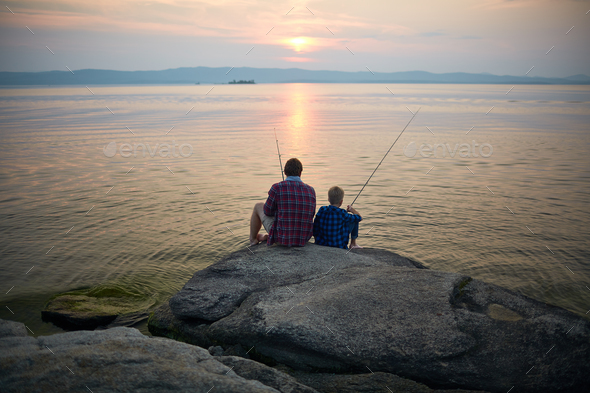 Fishing on sunset Stock Photo by Pressmaster | PhotoDune
