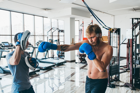 Men practicing boxing in gym Stock Photo by simbiothy | PhotoDune