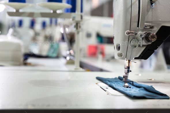 Sewing machine on textile fabric closeup, nobody Stock Photo by NomadSoul1