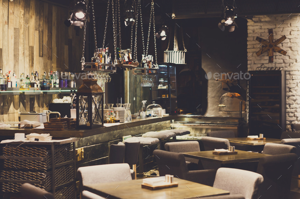 Interior of cozy restaurant, loft style Stock Photo by Milkosx | PhotoDune