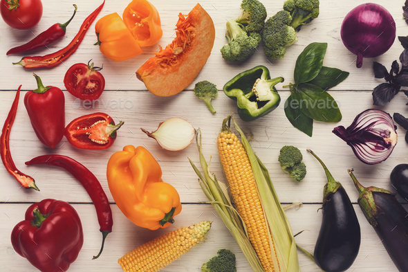 Rainbow background with lots of colorful vegetables Stock Photo by Milkosx