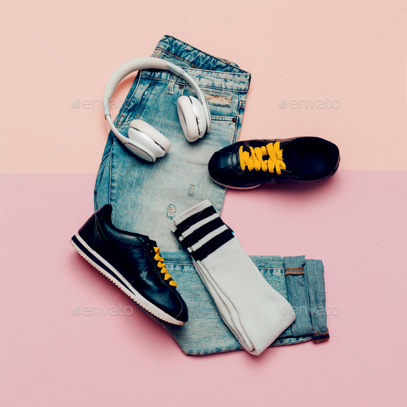 Jeans and sneakers. Knee socks. Urban Active outfit. Headphones. Stock Photo by EvgeniyaPorechenskaya