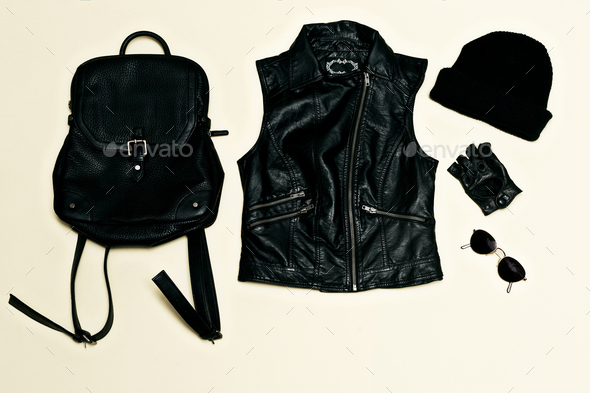 Rock style set. Black Urban fashion. Vest, Backpack cap. Black l Stock Photo by EvgeniyaPorechenskaya