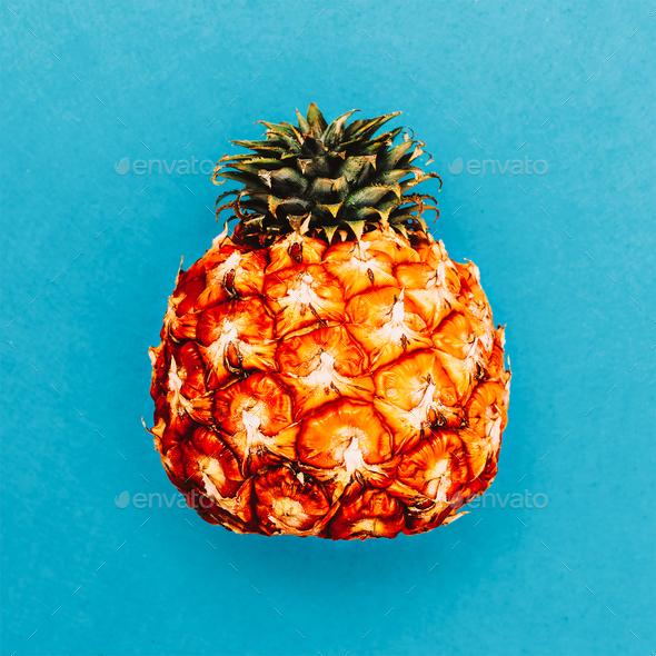 Pineapple on a blue background. Minimal. I love fruit. Fresh ide Stock Photo by EvgeniyaPorechenskaya