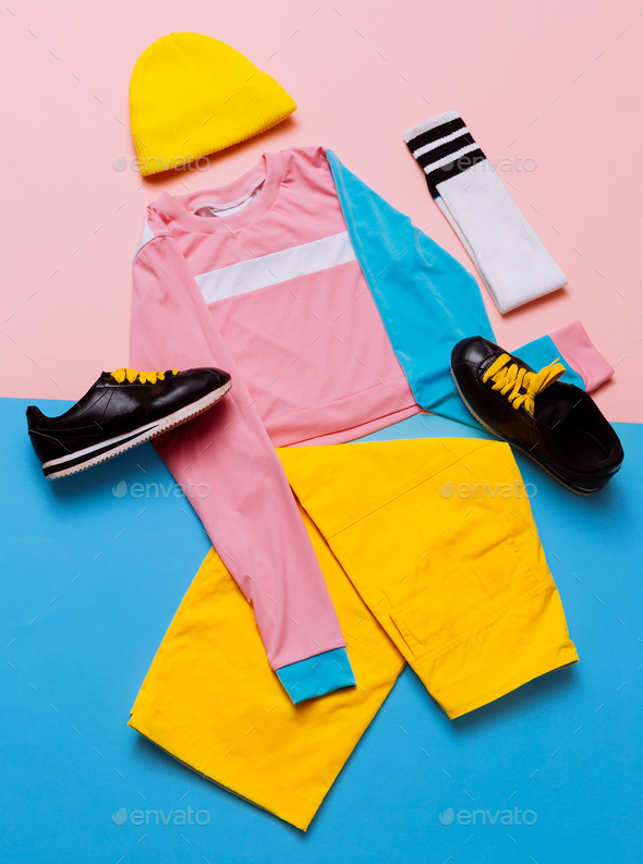 Stylish sports blouse and pants. Pastel trend. Fashion Accessori Stock Photo by EvgeniyaPorechenskaya
