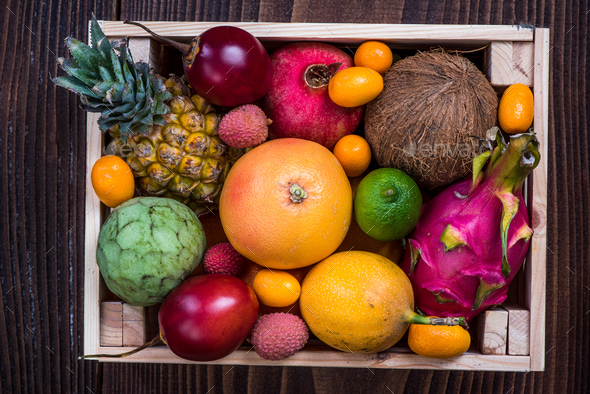 Wooden box with exotic fruits Stock Photo by merc67 | PhotoDune