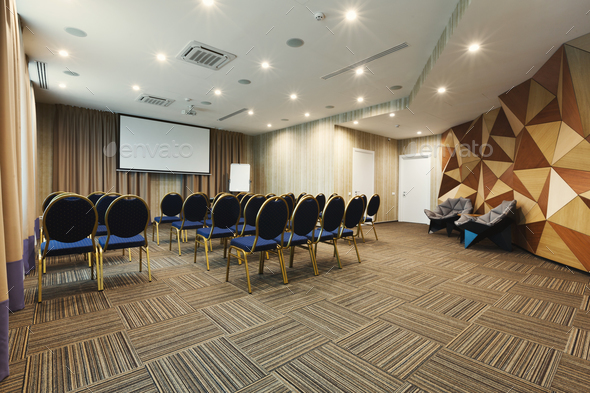 Interior of modern conference hall in hotel Stock Photo by Milkosx