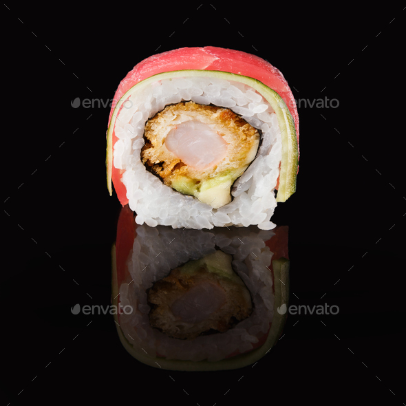 Japanese roll on black mirroring background Stock Photo by Milkosx