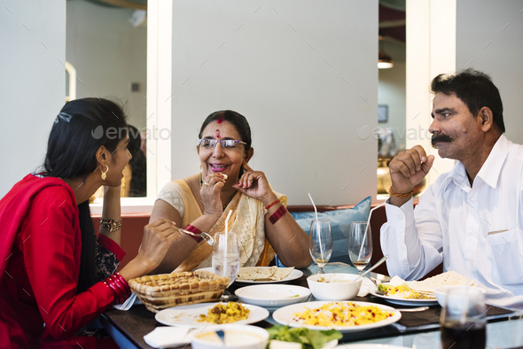Family having Indian food Stock Photo by Rawpixel | PhotoDune