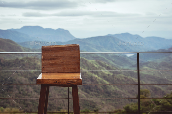 Wooden single chair on the balcony Stock Photo by kitzstocker | PhotoDune