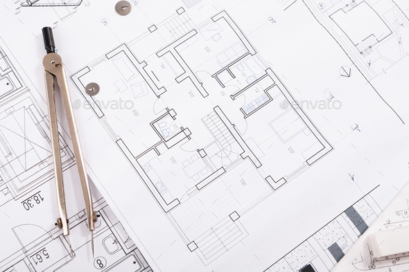 Architectural project, engineering tools on table. Stock Photo by Milkosx
