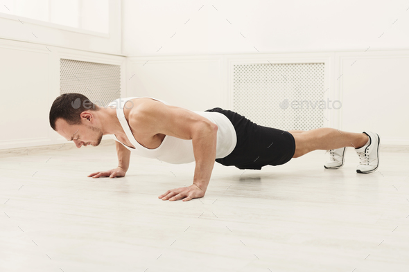 Male sportsman doing plank Stock Photo by Milkosx | PhotoDune