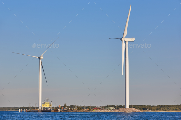 Windmills in the baltic sea. Renewable clean and green energy. Finland Stock Photo by ABBPhoto