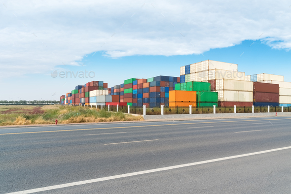 shipping container stack yard and road background Stock Photo by chuyu2014