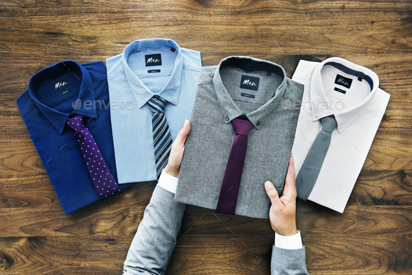 Businessman selecting shirt to wear Stock Photo by Rawpixel | PhotoDune
