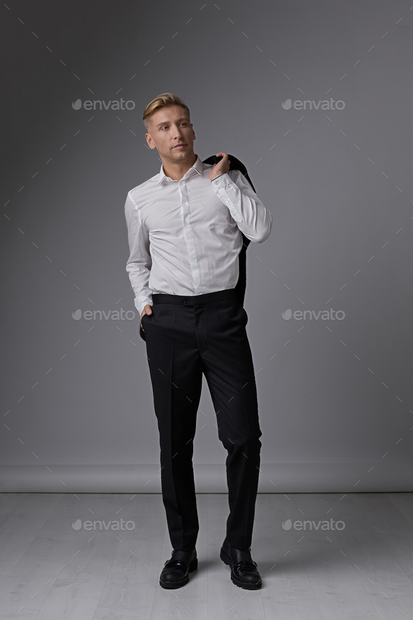 Confident businessman portrait posing relaxed Stock Photo by arthurhidden