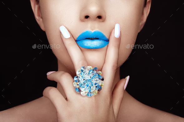 Beauty girl face close up with blue lips Stock Photo by heckmannoleg