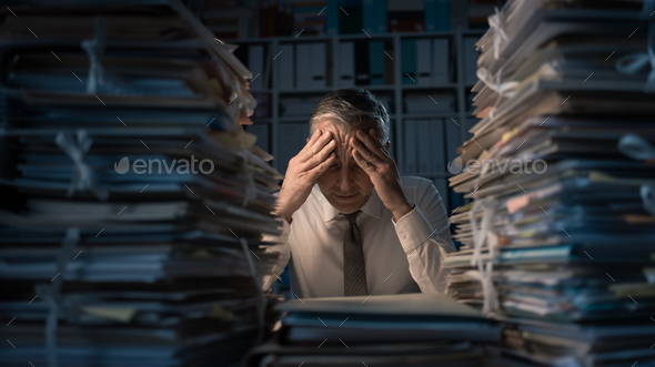 Desperate businessman working late Stock Photo by stokkete | PhotoDune