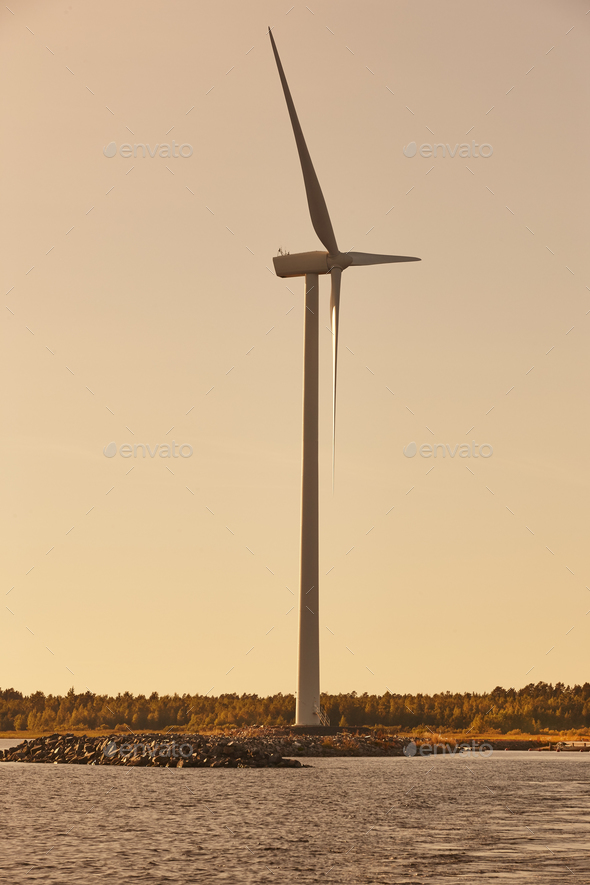 Windmill in the baltic sea. Renewable clean and green energy. Finland Stock Photo by ABBPhoto