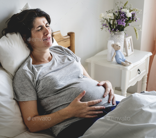 Pregnant woman with labor pain Stock Photo by Rawpixel | PhotoDune