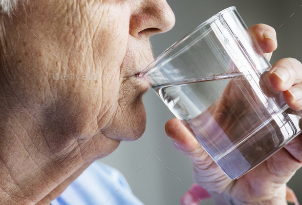 Side view of elderly woman drinking water Stock Photo by Rawpixel | PhotoDune