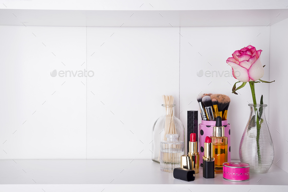 Shelf with cosmetics in bathroom on a white bathroom shelf Stock Photo by lyulkamazur