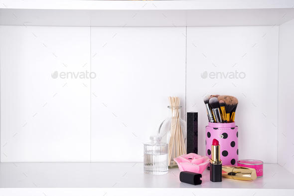 Shelf with cosmetics in bathroom on a white bathroom shelf Stock Photo by lyulkamazur