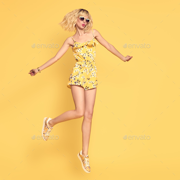 Blond Slim Model Having Fun in Fashion Sunglasses Stock Photo by 918Evgenij