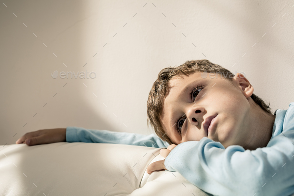 portrait of a young sad boy stock photo by altanaka photodune