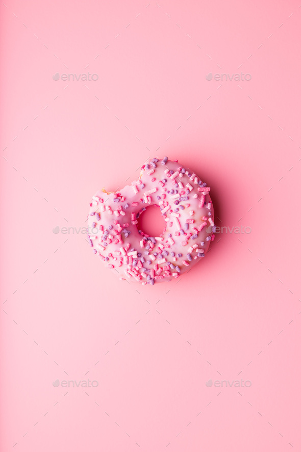A bitten donut. Stock Photo by jirkaejc | PhotoDune
