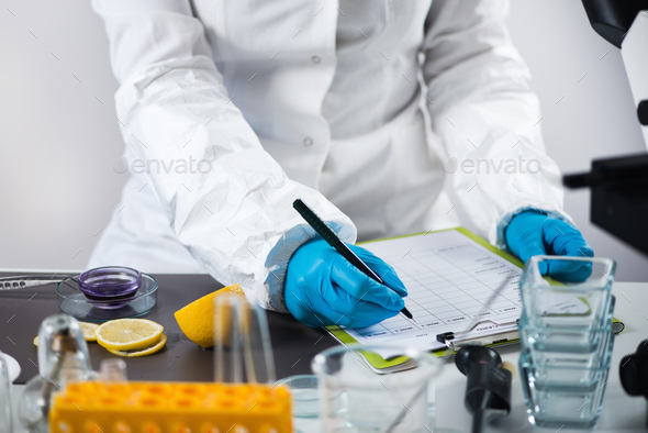 Food safety inspector working in a lab Stock Photo by microgen | PhotoDune