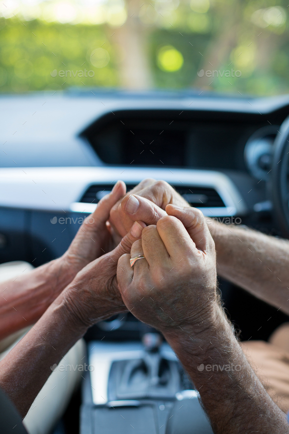 Senior couple holding hands in car Stock Photo by Wavebreakmedia | PhotoDune
