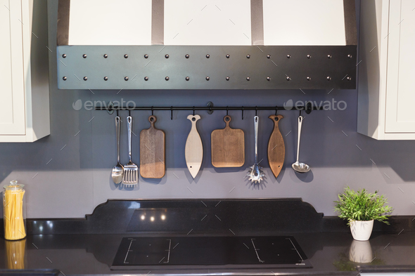 modern kitchen chopping board behind wall interior trend. Stock Photo by Vladdeep