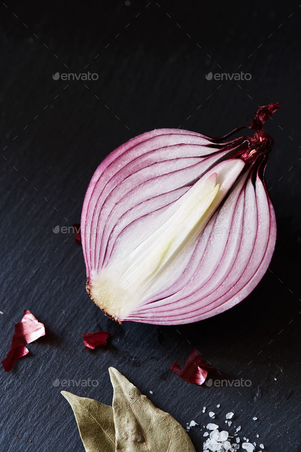 Sliced red spanish onion with bay leaf and sea salt Stock Photo by lenina11only
