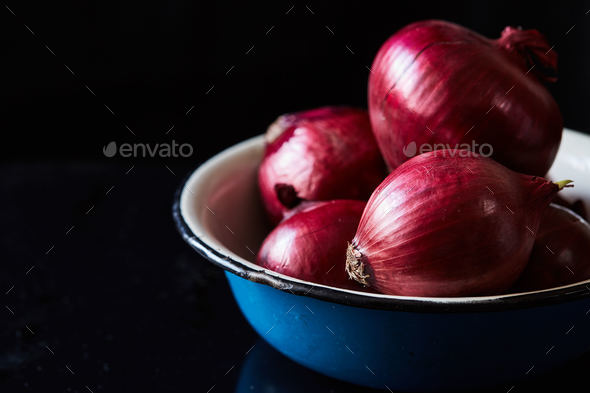 Sliced red spanish onion on vintage ceramic bowl Stock Photo by lenina11only