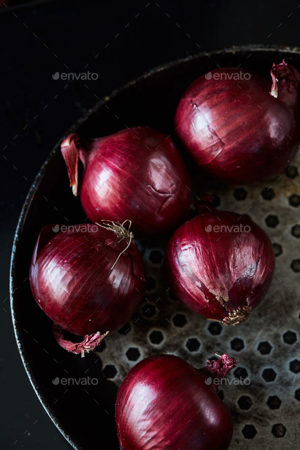 Sliced red spanish onion on vintage frying pan Stock Photo by lenina11only