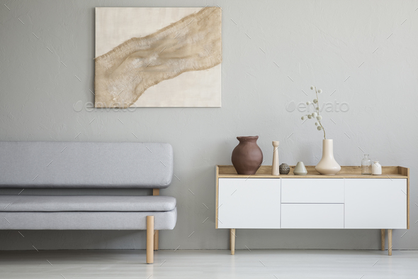 Real photo of a simple living room interior with a natural paint Stock Photo by bialasiewicz