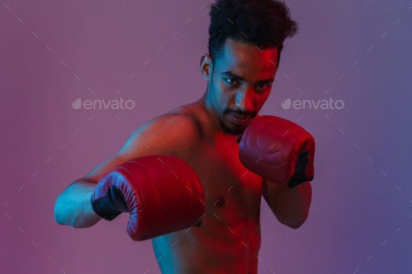 Portrait Of Focused Half Naked African American Man Poising In Boxing