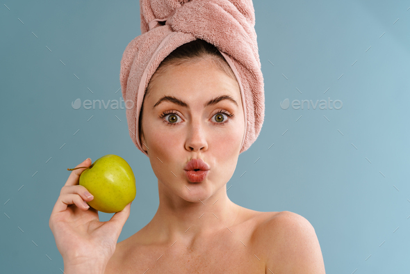 Half Naked Surprised Girl In Towel Posing With Apple Stock Photo By