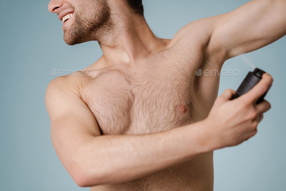 Handsome Smiling Nude Man Spraying Deodorant Stock Photo By Vadymvdrobot