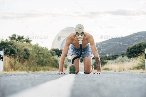 Naked Man With Tear Gas Mask On A Road Stock Photo By Addictive Stock