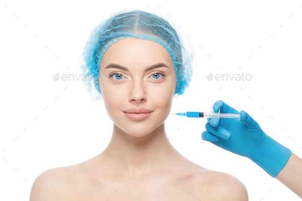 Pretty Woman Stands Naked In Medical Cap Ready To Receive Beauty Injection Stock Photo By