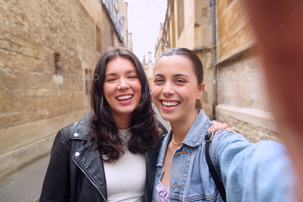 POV Shot Of Same Sex Female Couple Pose For Selfie As They Visit Oxford