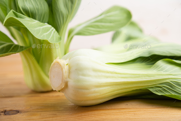 Fresh Green Bok Choy Or Pac Choi Chinese Cabbage On A Brown Wooden