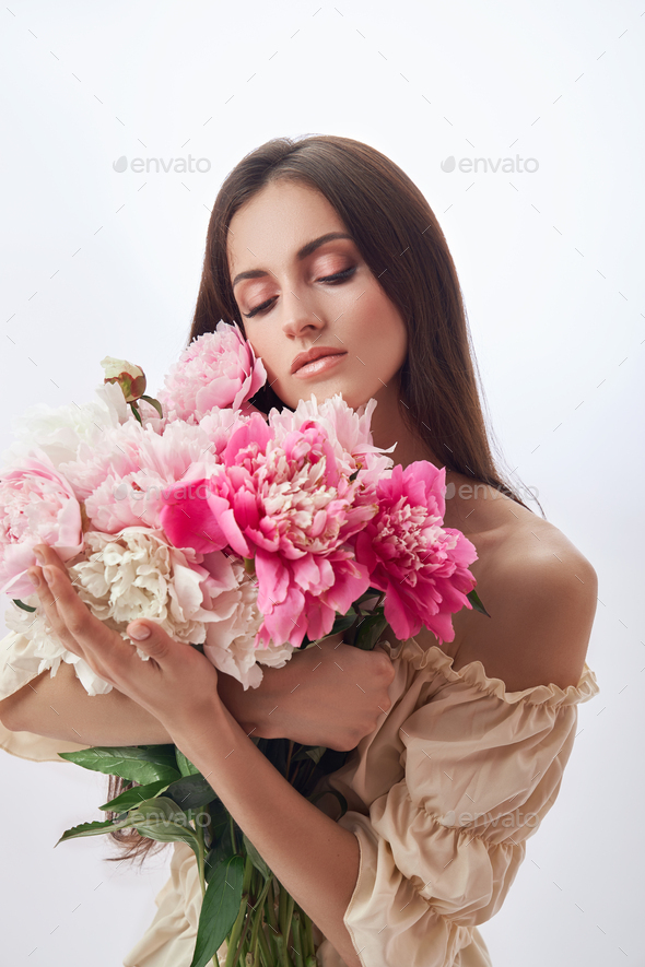 Beautiful Woman With Lots Of Pink Flowers In Her Hands Sexy Woman With