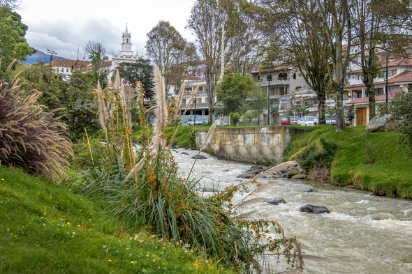 Tomebamba River And Todos Los Santos Church Tower Cuenca Ecuador