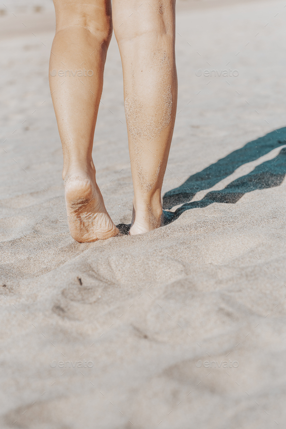 Nude Woman Legs Walking Barefoot At The Beach On The Sand In A Beuaitul