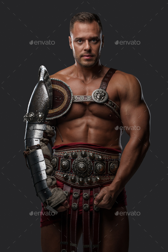 Muscular Gladiator With Naked Torso Staring At Camera Stock Photo By Fxquadro