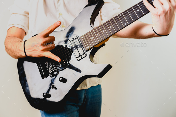 Guitarist Playing His Electric Guitar Isolated Background Stock Photo