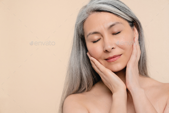 Closeup Cropped Mature Middle Aged Woman With Grey Hair And Eyes Closed